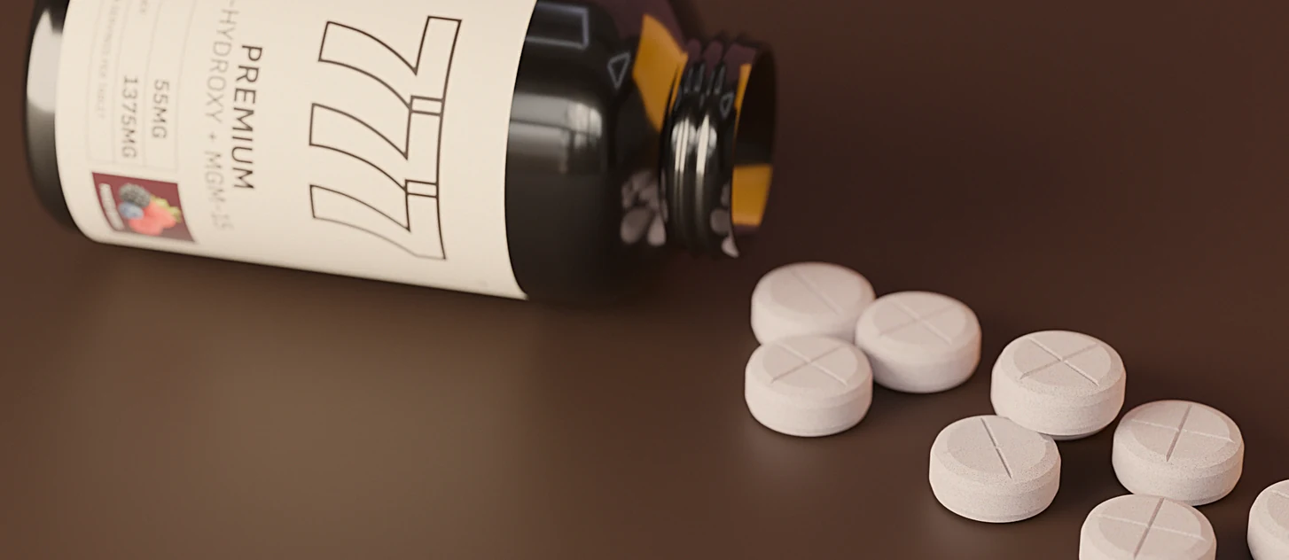 Open 777 bottle with cross-scored tablets